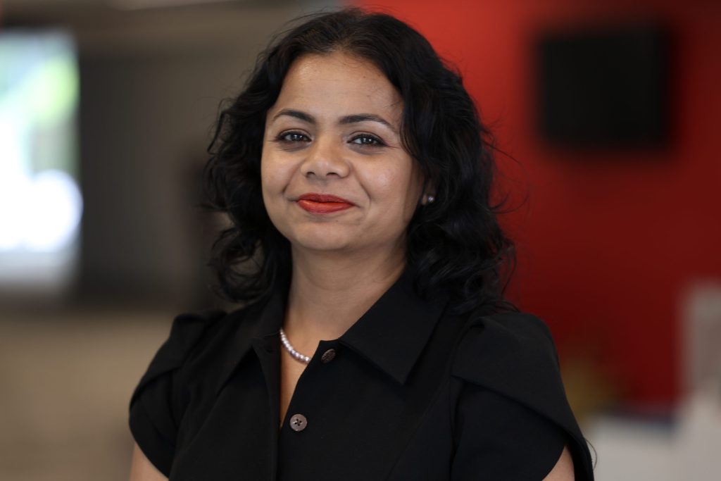 professional headshot of Madhu M.