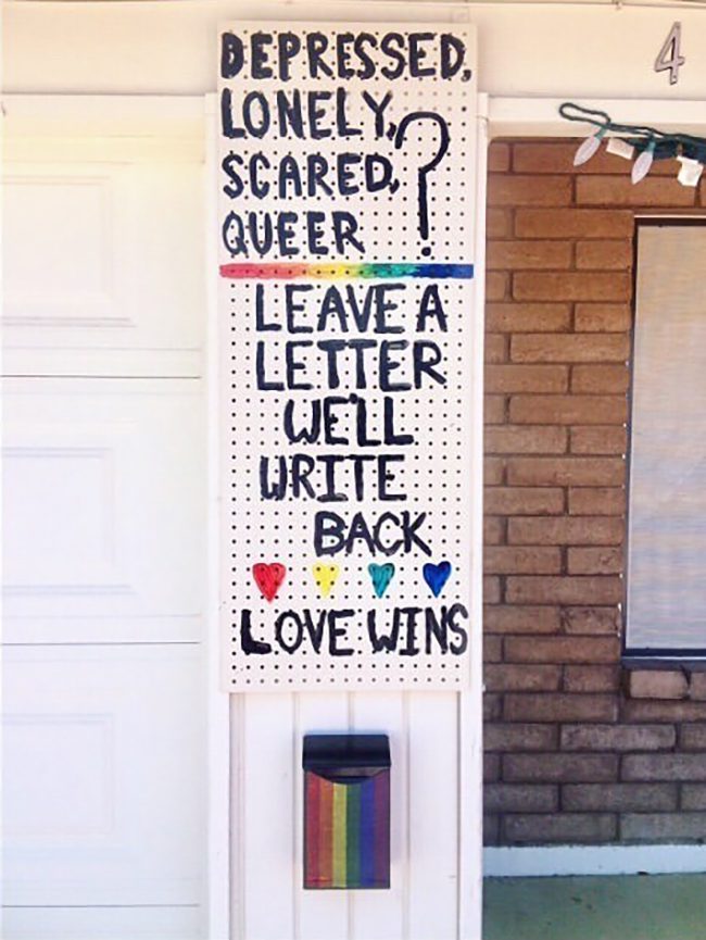 sign encouraging individuals to leave a letter with mailbox