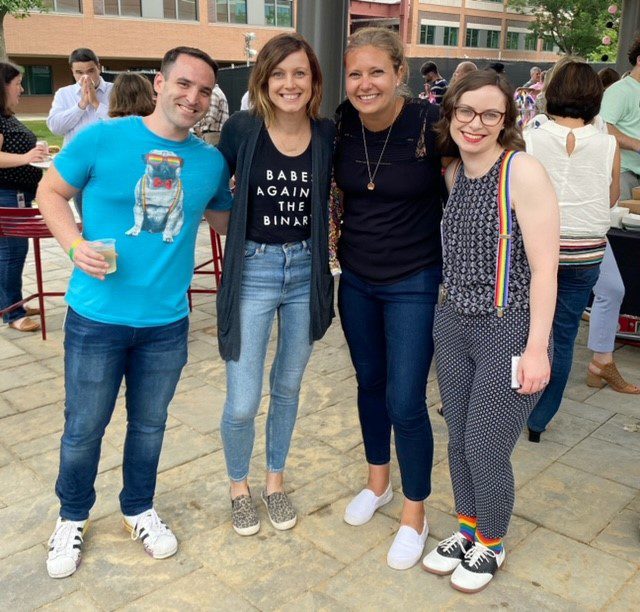 Nicole G. with OPEN crew members at Vanguard event