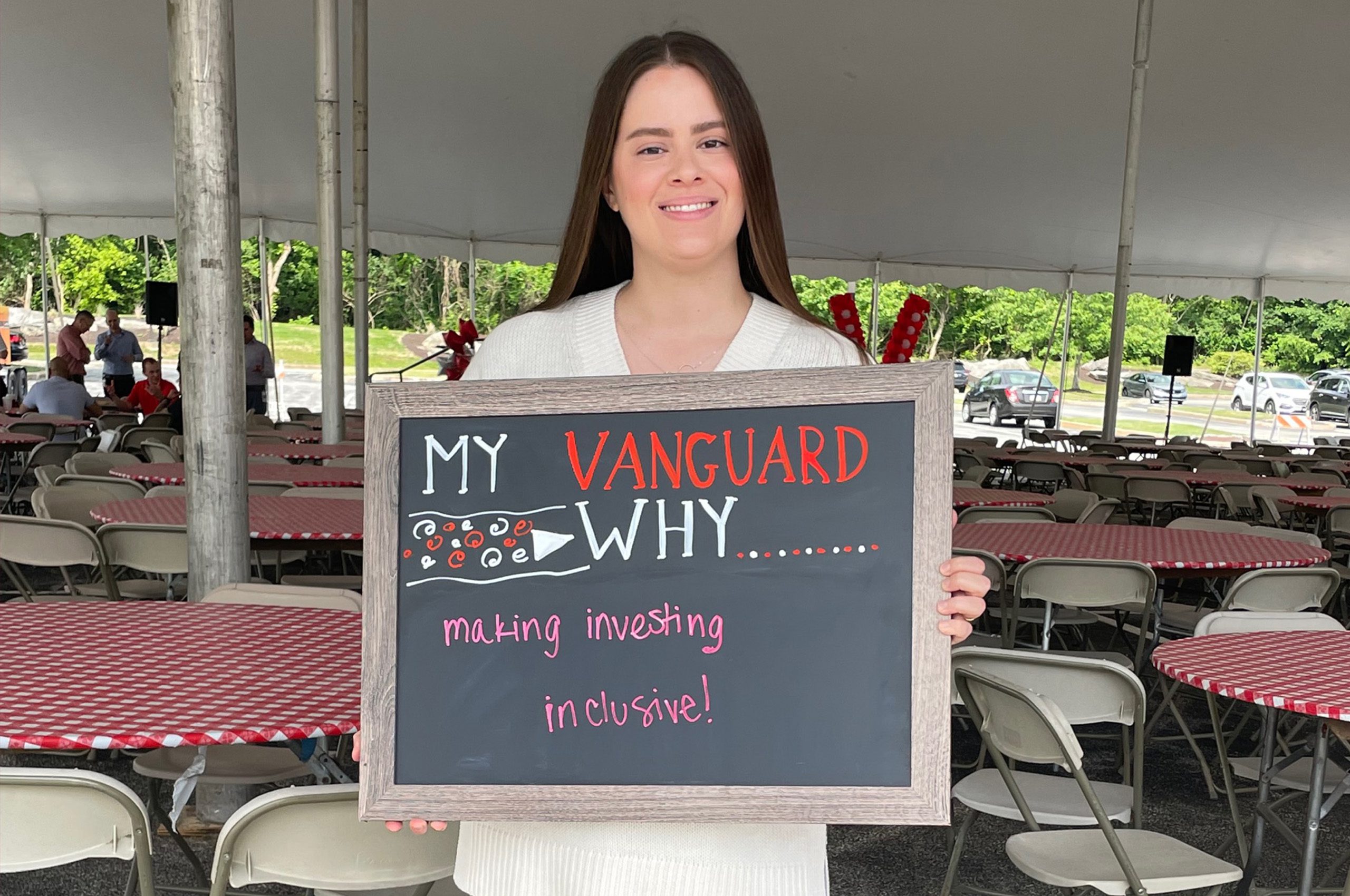 Elizabeth E. holding My Vanguard Why sign